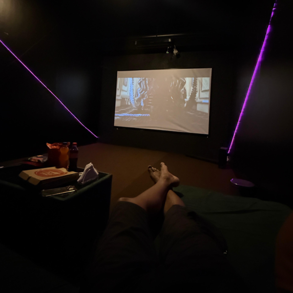 Movie playing inside a private cinema room